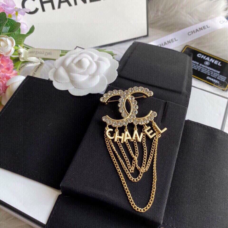Ch*el brooches